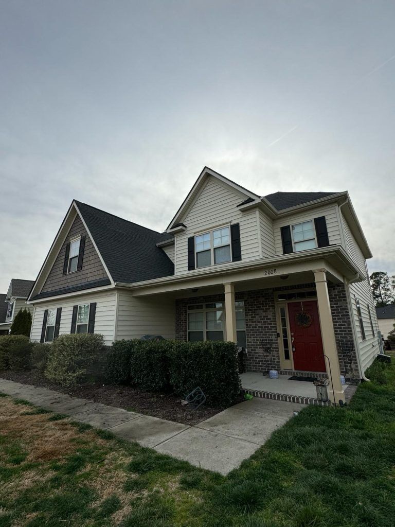 114eef7b-8508-4854-99a0-0adbcdcccd8c_item_f2219a18-e26a-45f9-bae3-95521e533baa Single-story brick home with a two-car garage and newly installed shingle roof in Raleigh, NC