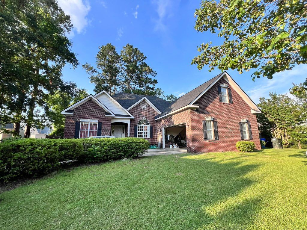 ebb10dd5-351d-410f-abb5-880b22f81acf_item_2284da7e-56d4-4d18-86f4-3151a99af5f7 Aerial drone view of a completed residential roof replacement in Raleigh, NC