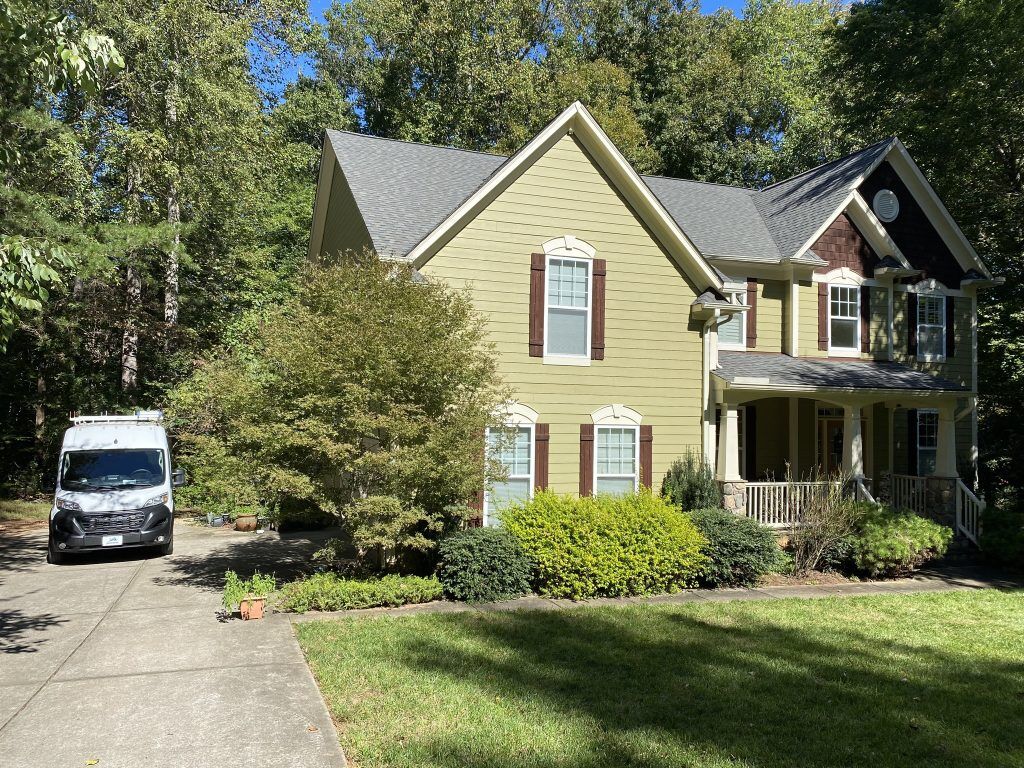 item_a7178263-d0d6-4db7-ab98-ff8b89337f23 Brick ranch home with a covered front porch and new shingle roof in Raleigh, NC